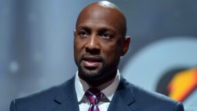Alonzo Mourning speaking at an event