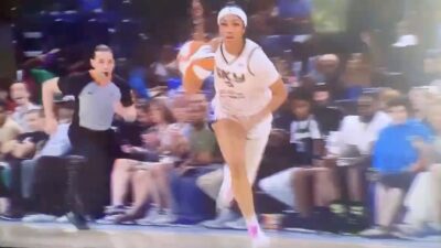 Chicago Sky rookie Angel Reese dribbling