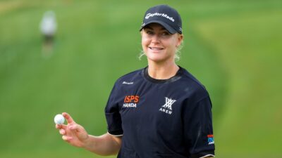 Charley Hull holding a golf ball
