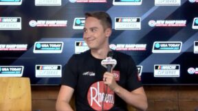 Christopher Bell smiling at a press conference