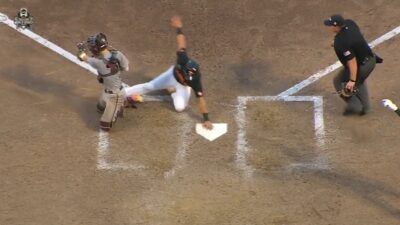 Hunter Ensley touches home plate