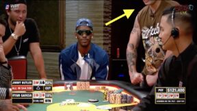 Ryan Garcia flexing while next to Jimmy Butler at a poker game