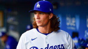 Tyler Glasnow wears a Dodgers cap and uniform