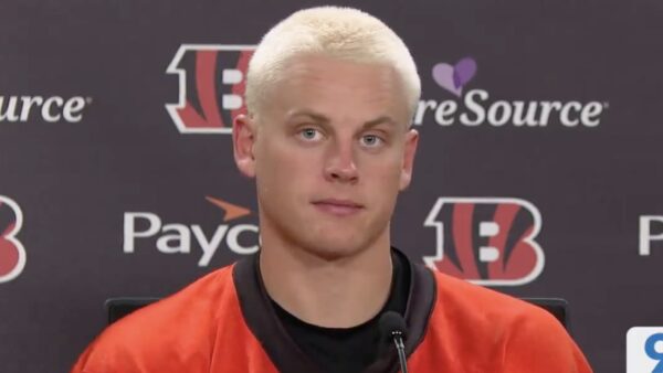 Joe Burrow in a press conference with bleach blonde hair