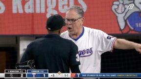 Rangers manager Bruce Bochy arguing with umpire Edwin Moscoso