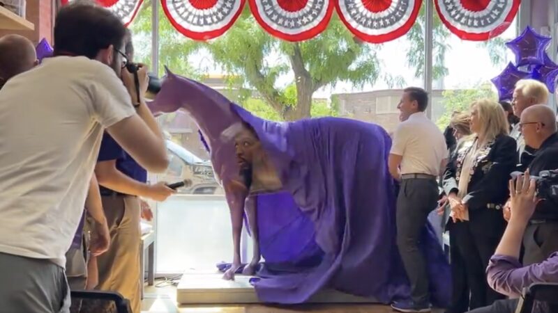 Damian Lillard's face on a horse statue