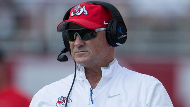 Jeff Tedford wearing a headset