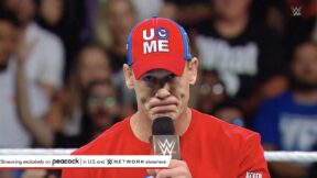 John Cena holding a WWE mic