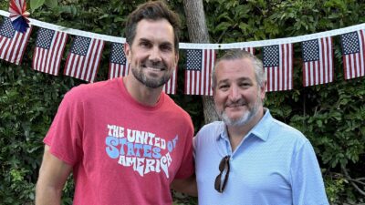 Matt Leinart next to Ted Cruz