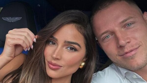 Olivia Culpo poses with Christian McCaffrey