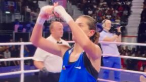 Svetlana Staneva makes an X gesture after losing to Lin Yu-ting