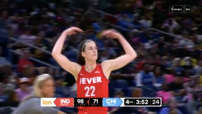 Caitlin Clark playing to the crowd during Sky-Fever matchup