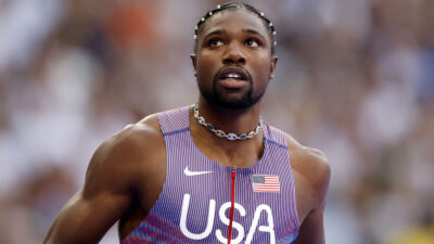 Noah Lyles wearing a Team USA singlet