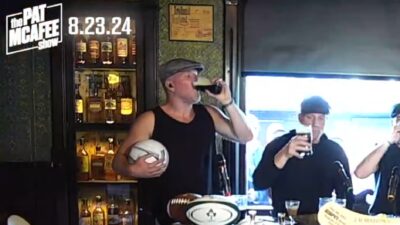 Pat McAfee drinks a beer