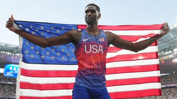 Shelby McEwen celebrating his medal