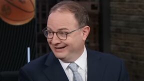 Adrian Wojnarowski smiles