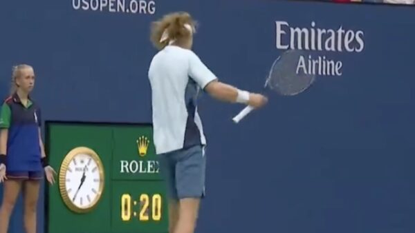 Andrey Rublev smashes his racquet off his own hand