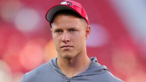 Christian McCaffrey looks on