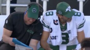 Nathaniel Hackett talks to Aaron Rodgers on the sideline