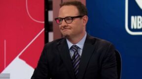 Adrian Wojnarowski at an ESPN desk