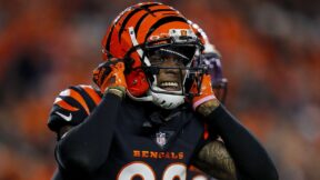 Bengals CB Cam Taylor-Britt holding his helmet