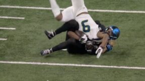 Kenneth Walker getting flipped during Seahawks-Lions game