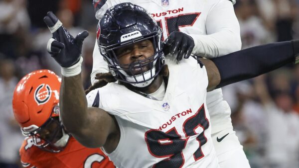 Mario Edwards Jr celebrates a tackle