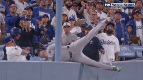 Alex Verdugo making a catch in foul ground during Game 1 of Yankees-Dodgers World Series