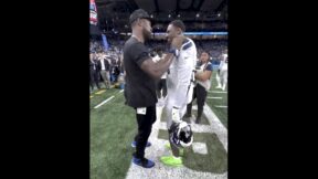 DK Metcalf standing next to Calvin Johnson during Lions-Seahawks game