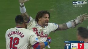 Nick Castellanos raises his arms