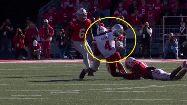 An Ohio State player committing a targeting violation