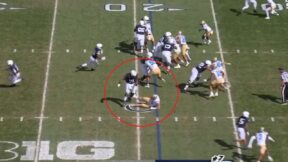 Penn State player pancakes a defender