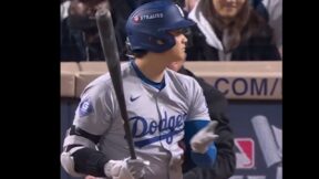 Shohei Ohtani holds his hands