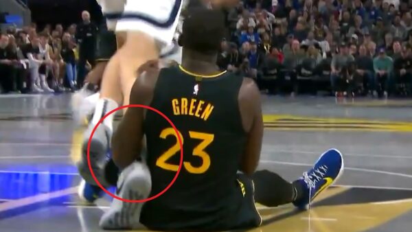 Draymond Green tripping Zach Edey