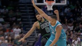 Grant Williams bumping into Jayson Tatum during a Celtics-Hornets game