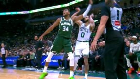 Jayson Tatum landing on Giannis Antetokounmpo's foot