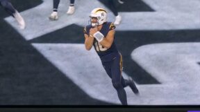 Justin Herbert doing a touchdown celebration