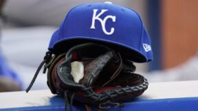 A Kansas City Royals hat and glove