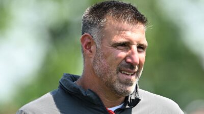 Mike Vrabel looks on