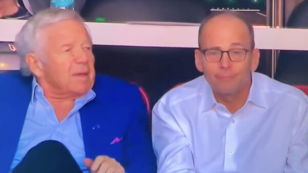 Robert Kraft and Jonathan Kraft in a luxury box