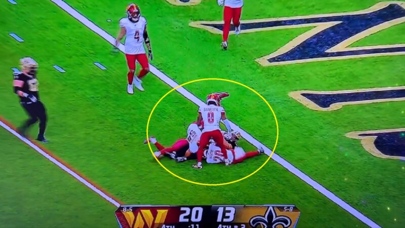 Commanders and Saints players