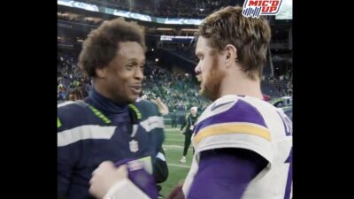 Geno Smith and Sam Darnold sharing a moment after Seahawks-Vikings game