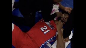 Joel Embiid on the ground with an injury