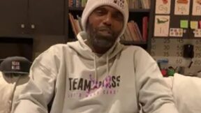 Randy Moss in a sweatshirt