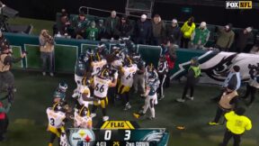 Steelers and Eagles players in a scrum