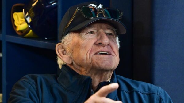 Bob Uecker looks on