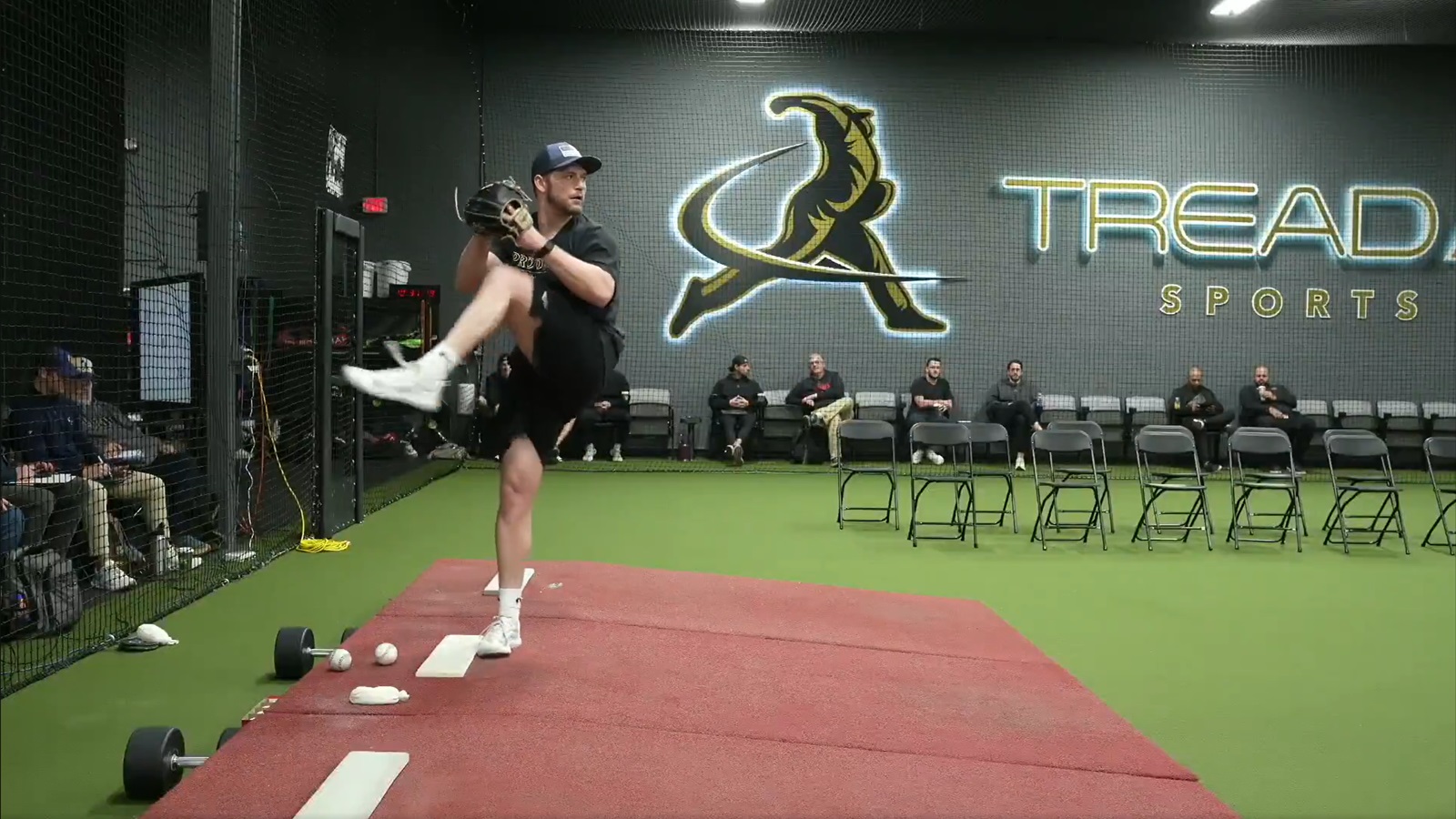 Kenny Serwa throwing for scouts