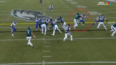 Mekhi Becton blocks a player
