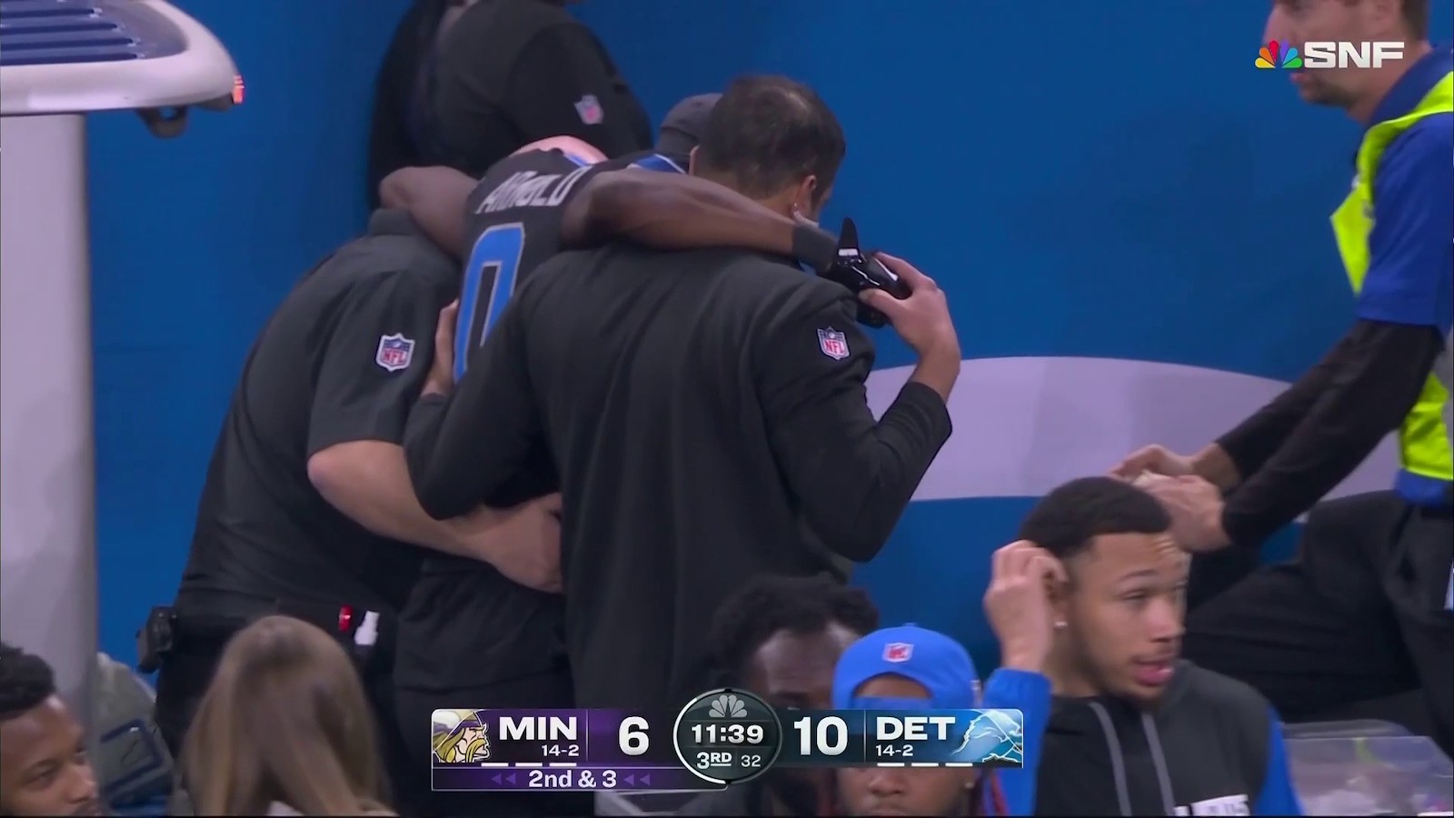 Lions cornerback Terrion Arnold being carried off the field due to injury