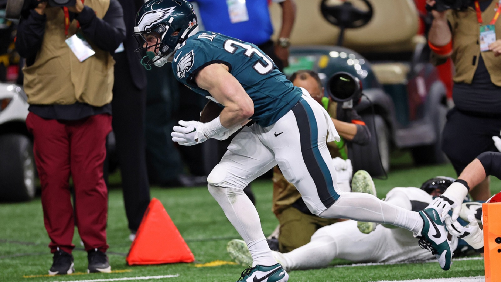 Cooper DeJean running with the ball